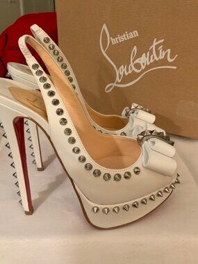 Christian Louboutin womens White Leather Peep-Toe Heels With Spikes & Bow Design